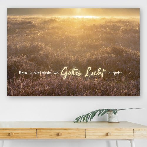 Christliches Leinwandbild „Wo Gottes Licht aufgeht" mit warmem Lichtmotiv.
